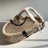 Custom handmade shed deer antler basket in natural and black stripe by LA based Artist, Dax Savage.