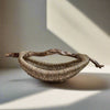 Custom Driftwood Handle Basket in natural color is Handmade by Los Angeles based Artist, Dax Savage.