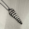 Snake Rattle Pendant Necklace in Sterling Silver by LA based artist, Dax Savage.