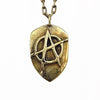 Custom Iconic Anarchy Symbol Pendant in Rock Star Brass by Dax Savage Jewelry.